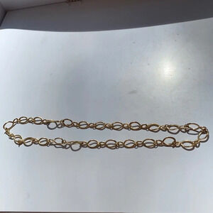 Two gold look necklaces chains‎ loops spirals